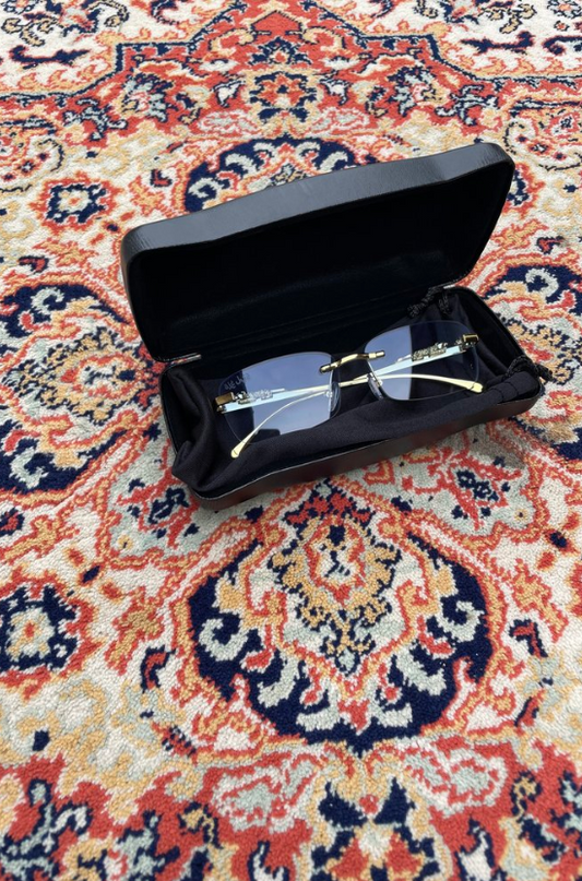blue tinted "abu diktator" sunglasses